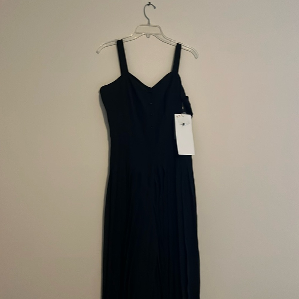 This size 10 jumpsuit is brand new with tags.